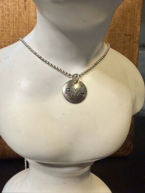 Stamped “FML” Necklace. 16”.